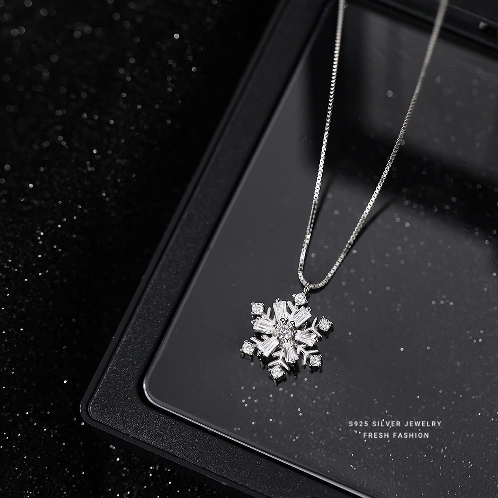 Sterling silver diamond snowflake rotatable necklace