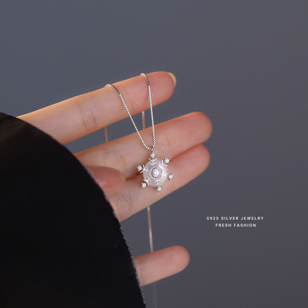 Sterling silver diamond snowflake rotatable necklace